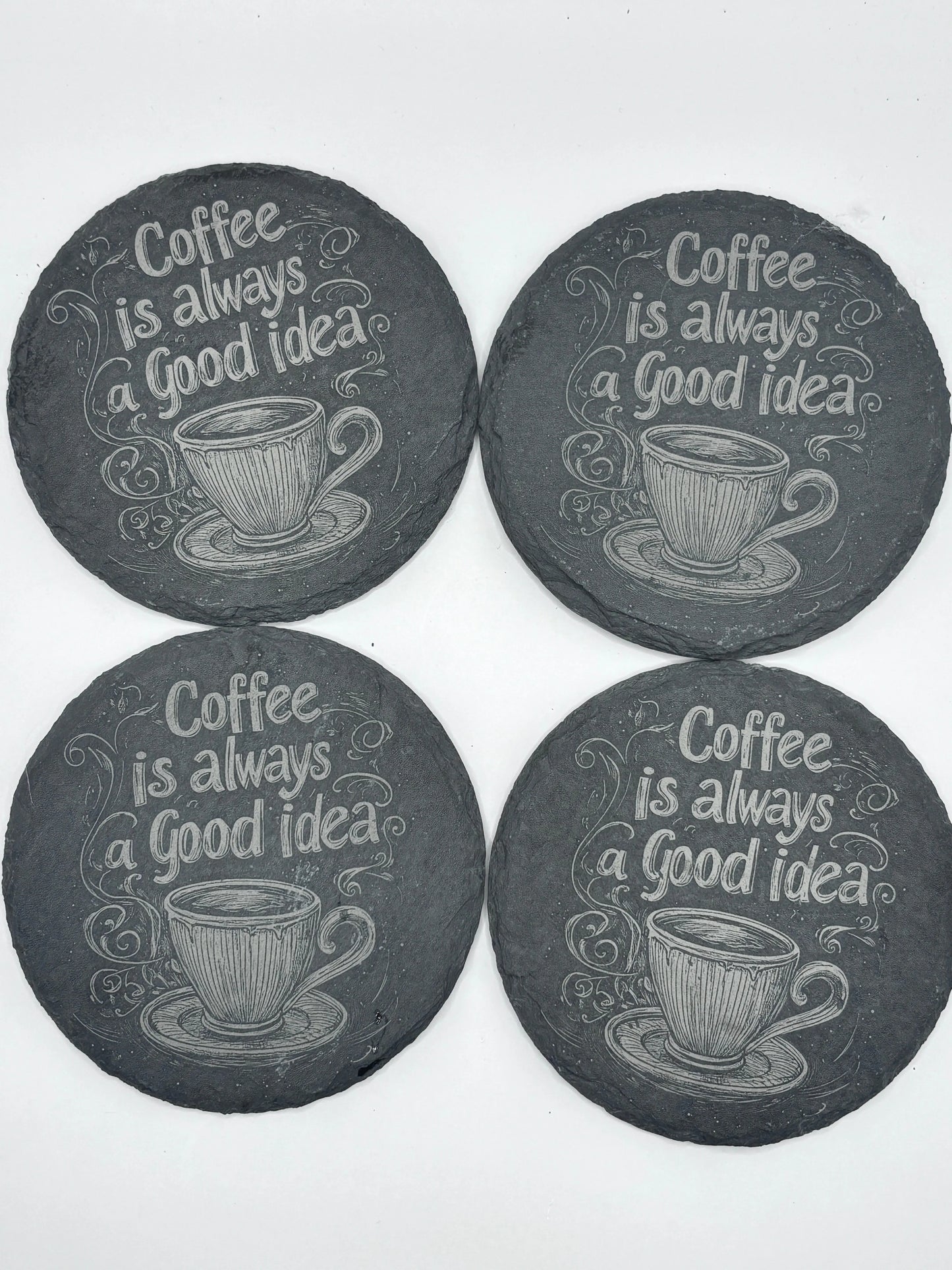 Underlägg i skiffer 4-pack – stilrena skydd för bord
